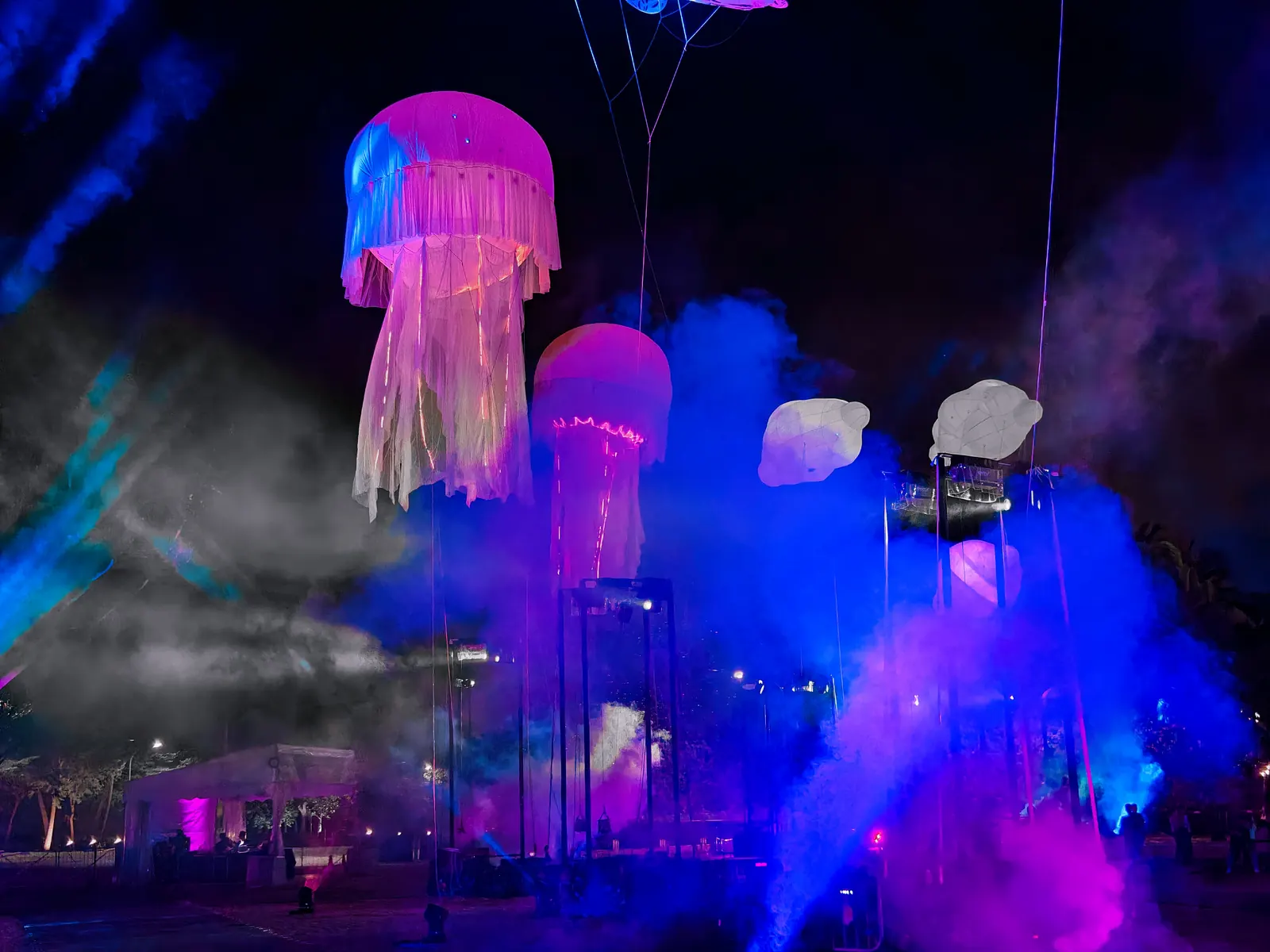 Mist and light around giant floating inflatables at Sentosa