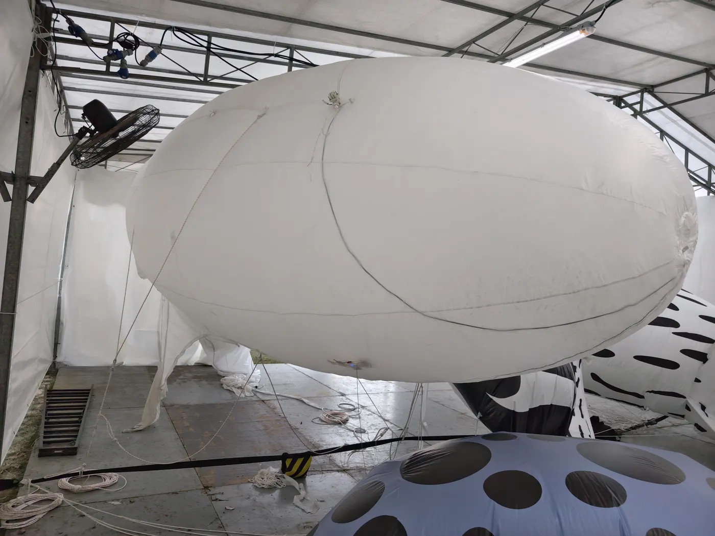 Helium fill and inflation test in factory