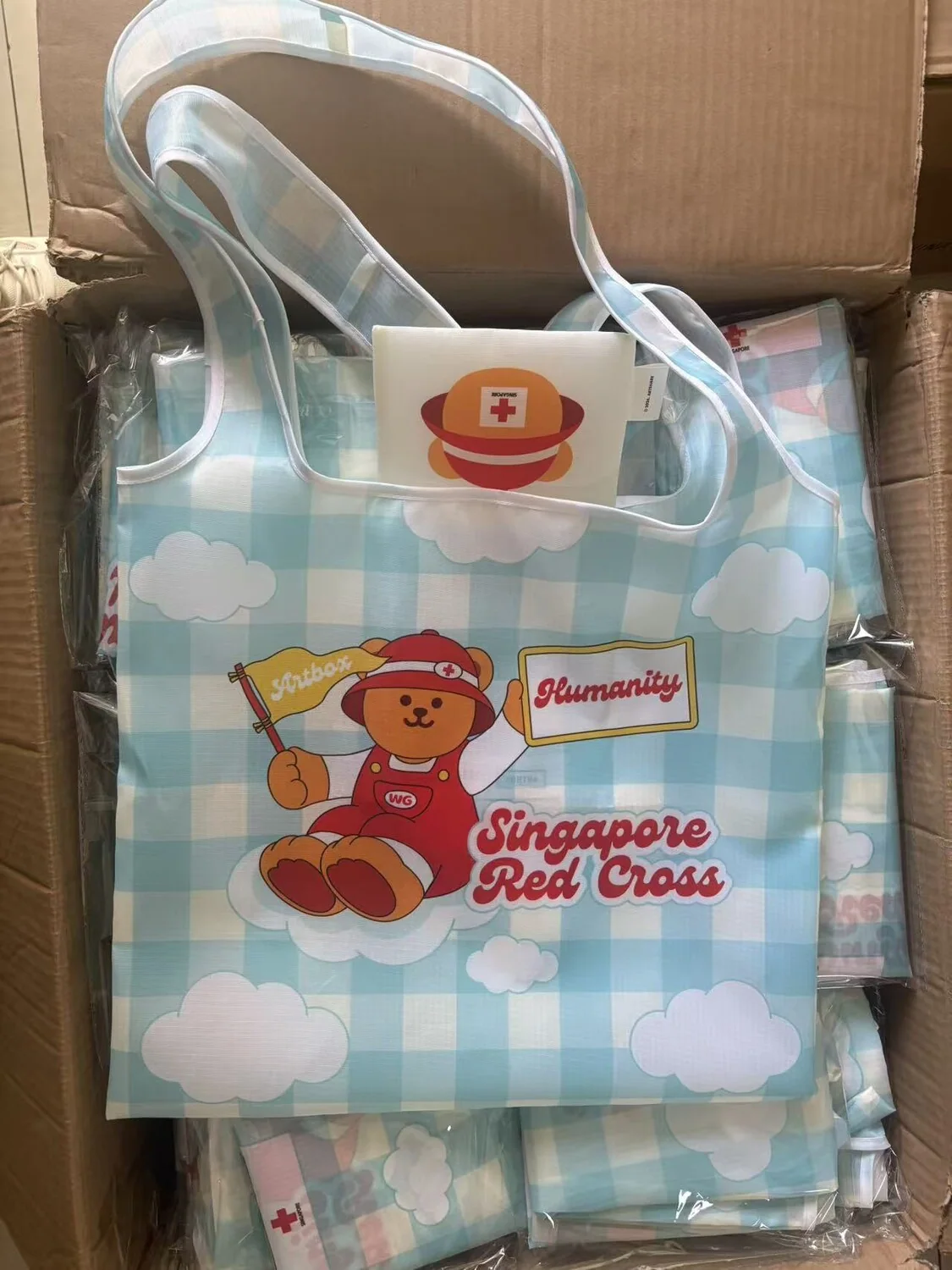 Foldable event bags packed in cartons before shipment